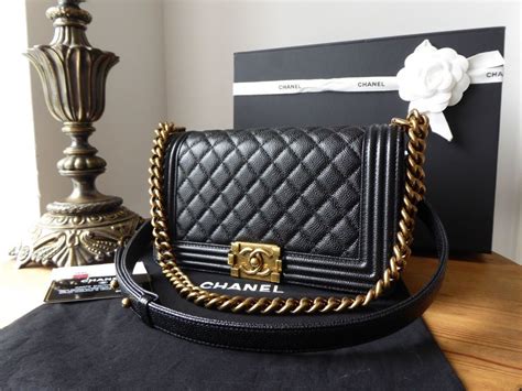 chanel black caviar medium boy bag|The Ultimate Guide to the Chanel Boy Bag .